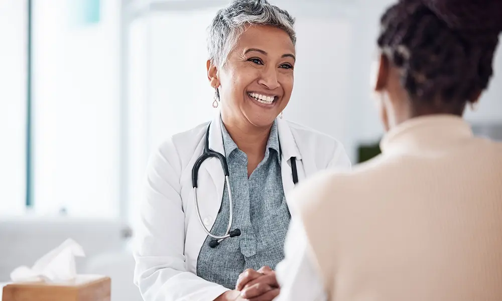 woman helping another woman